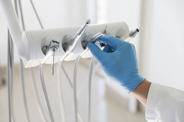 Professional Tooth Extraction technician working in Chatham County County, NC